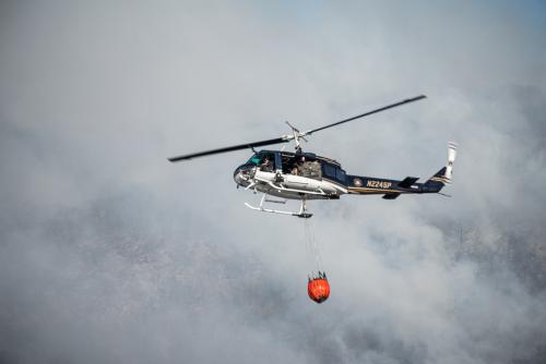 Helicopters dump water on the fire on Breakneck Ridge that broke out March 9. Photo credit: Pierce Johnston
